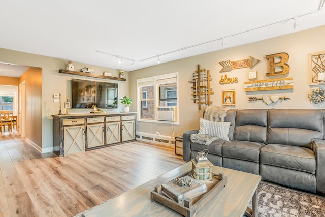 2241 S 17th Ave, North Riverside, IL 60546 - living area featuring track lighting, wood finished floors, and cooling unit