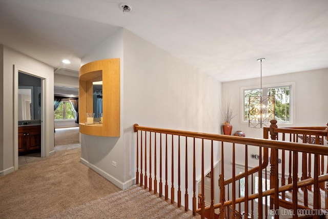 7N107 Hastings Dr, Saint Charles, IL 60175 - corridor featuring an upstairs landing, carpet flooring, and a chandelier
