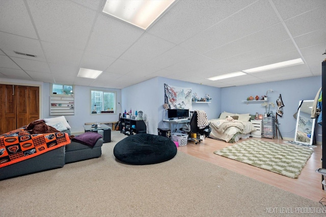 7N107 Hastings Dr, Saint Charles, IL 60175 - living area featuring wood finished floors and a paneled ceiling