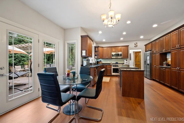 7N107 Hastings Dr, Saint Charles, IL 60175 - dining space with a chandelier, wood finished floors, and recessed lighting
