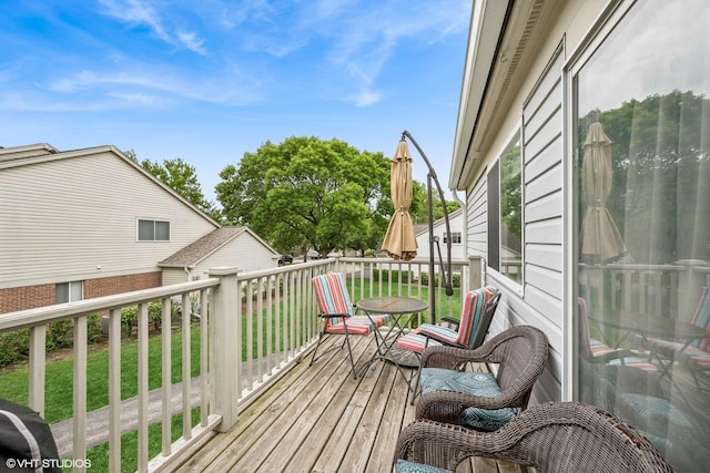 1508 Seville Ct Unit D2, Wheeling, IL 60090 - wooden deck featuring a lawn