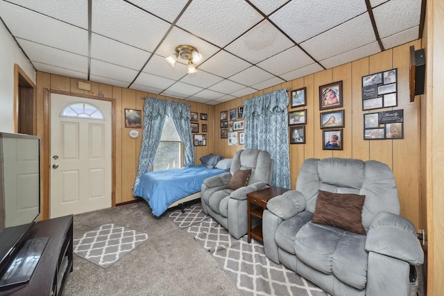 525 Munroe St, Joliet, IL 60436 - bedroom with carpet flooring, wooden walls, and a paneled ceiling