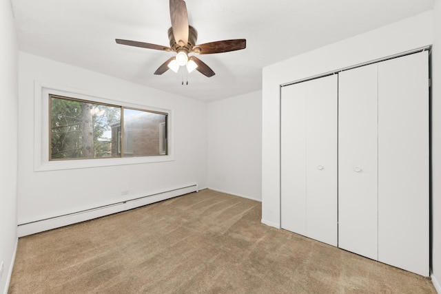 1320 Lore Ln Unit 2-201, Lombard, IL 60148 - unfurnished bedroom with a baseboard heating unit, carpet floors, a closet, and ceiling fan