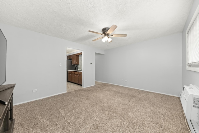 1320 Lore Ln Unit 2-201, Lombard, IL 60148 - spare room featuring ceiling fan, light colored carpet, and a textured ceiling