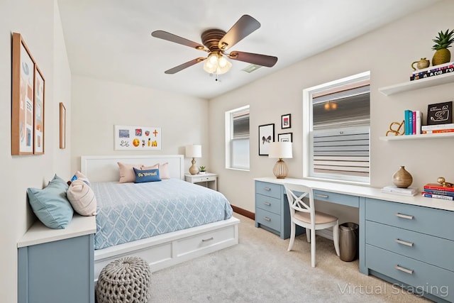 1940 S Racine Ave, Chicago, IL 60608 - bedroom with light colored carpet, an office area, and a ceiling fan