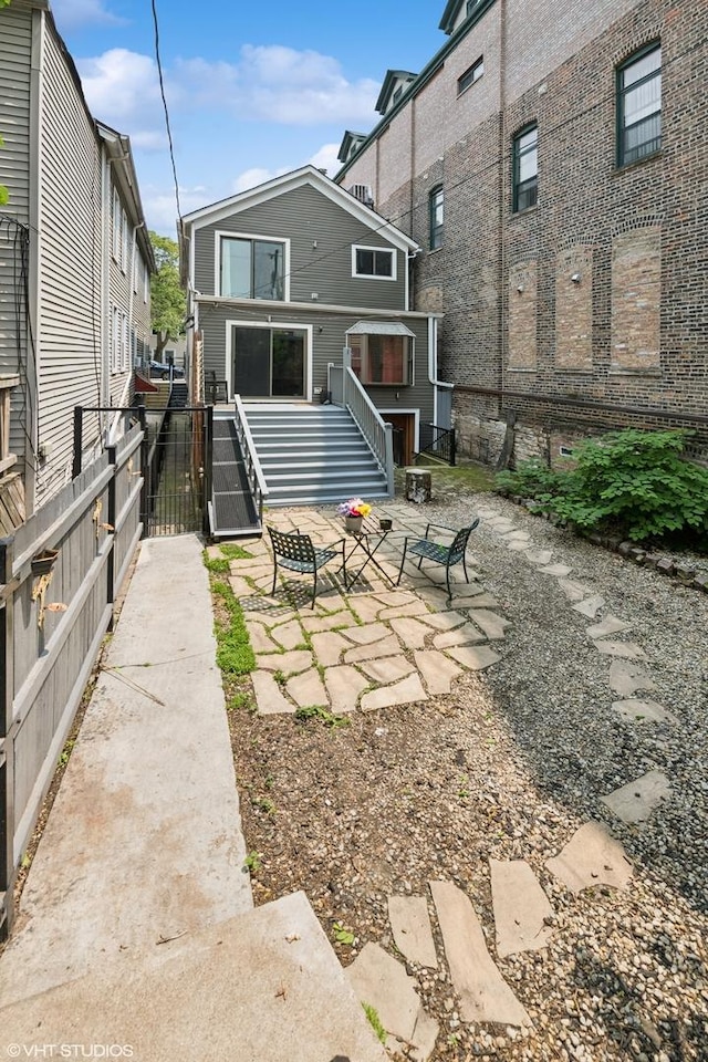 1940 S Racine Ave, Chicago, IL 60608 - back of house with a patio and a gate