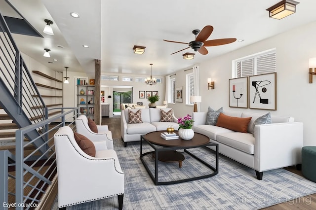 1940 S Racine Ave, Chicago, IL 60608 - living area with wood finished floors, recessed lighting, ceiling fan, stairs, and a chandelier