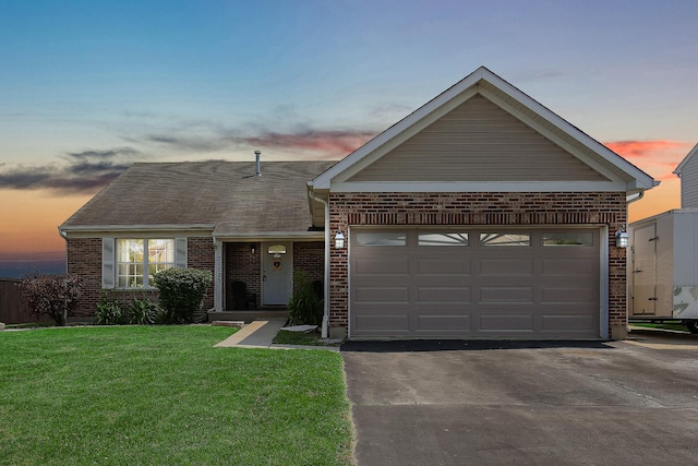 21023 Siegel Dr, Crest Hill, IL 60403 - view of front of home featuring brick siding, driveway, and a front lawn