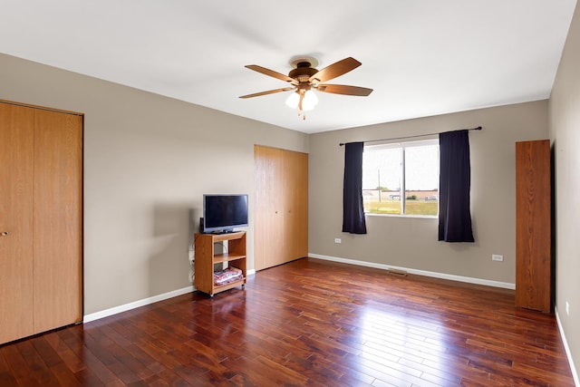 21023 Siegel Dr, Crest Hill, IL 60403 - unfurnished bedroom featuring hardwood / wood-style flooring, multiple closets, and a ceiling fan