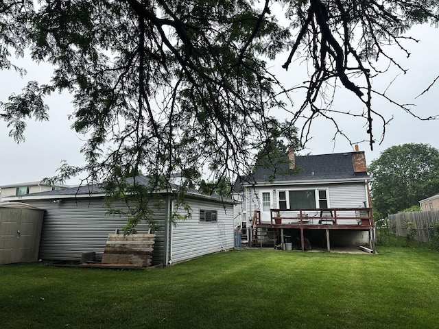 115 Country Club Dr, Northlake, IL 60164 - rear view of house featuring a wooden deck, a chimney, and a shed