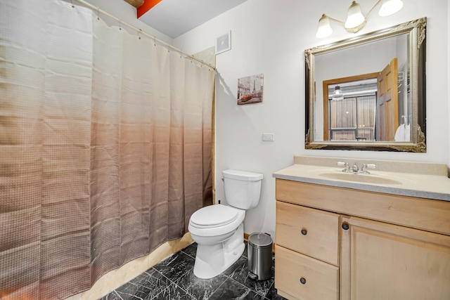 6135 N Broadway St Unit 303, Chicago, IL 60660 - bathroom featuring marble finish floors, vanity, and a shower with curtain