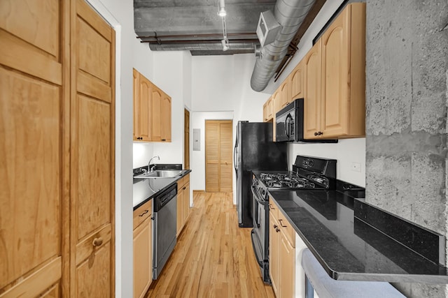 6135 N Broadway St Unit 303, Chicago, IL 60660 - kitchen featuring gas range, black microwave, light wood finished floors, dishwasher, and electric panel