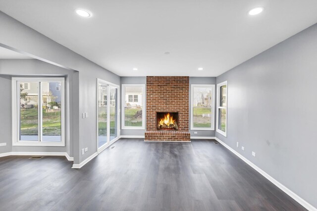 8 Cheswick Ct, Schaumburg, IL 60194 - unfurnished living room featuring dark wood finished floors, a fireplace, and recessed lighting
