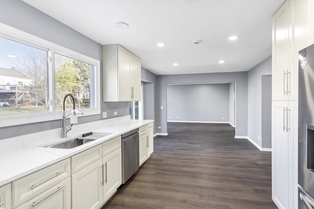 8 Cheswick Ct, Schaumburg, IL 60194 - kitchen featuring stainless steel appliances, light countertops, recessed lighting, and dark wood-style floors