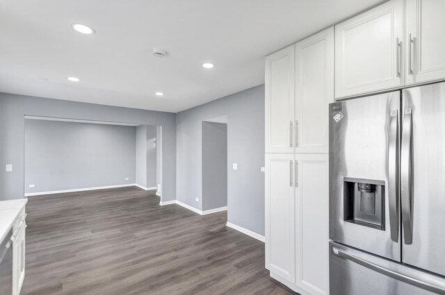 8 Cheswick Ct, Schaumburg, IL 60194 - kitchen with stainless steel refrigerator with ice dispenser, white cabinetry, dark wood-type flooring, recessed lighting, and light countertops