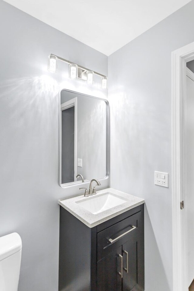 8 Cheswick Ct, Schaumburg, IL 60194 - bathroom with vanity and toilet