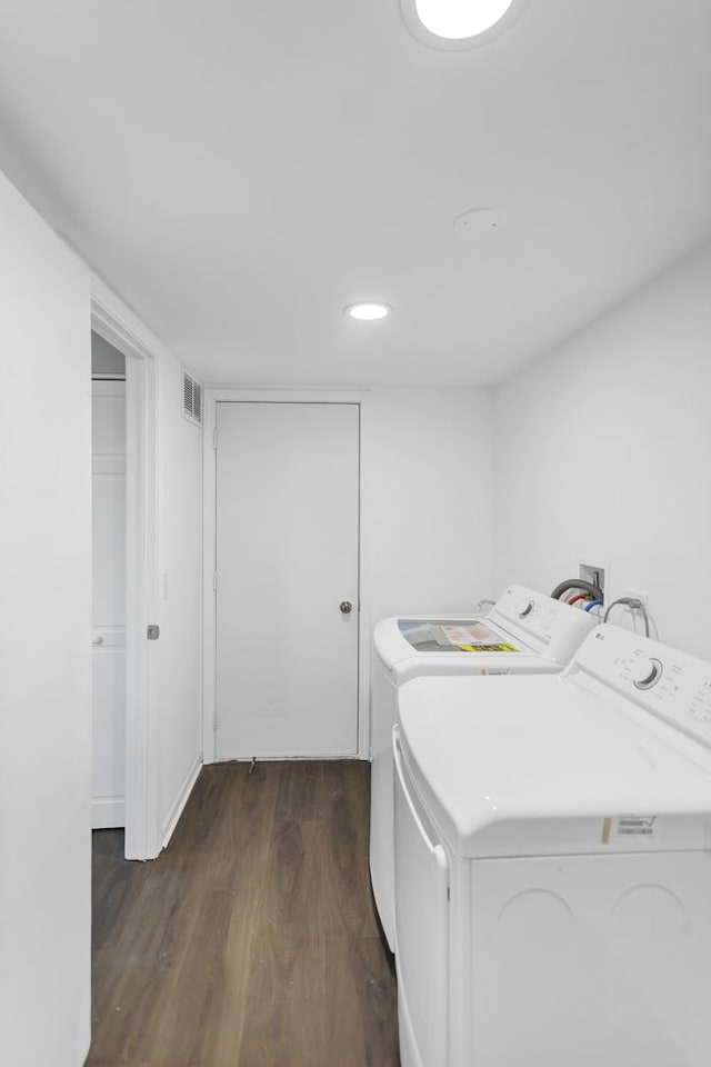 8 Cheswick Ct, Schaumburg, IL 60194 - laundry room with washer and clothes dryer, dark wood-style flooring, and recessed lighting