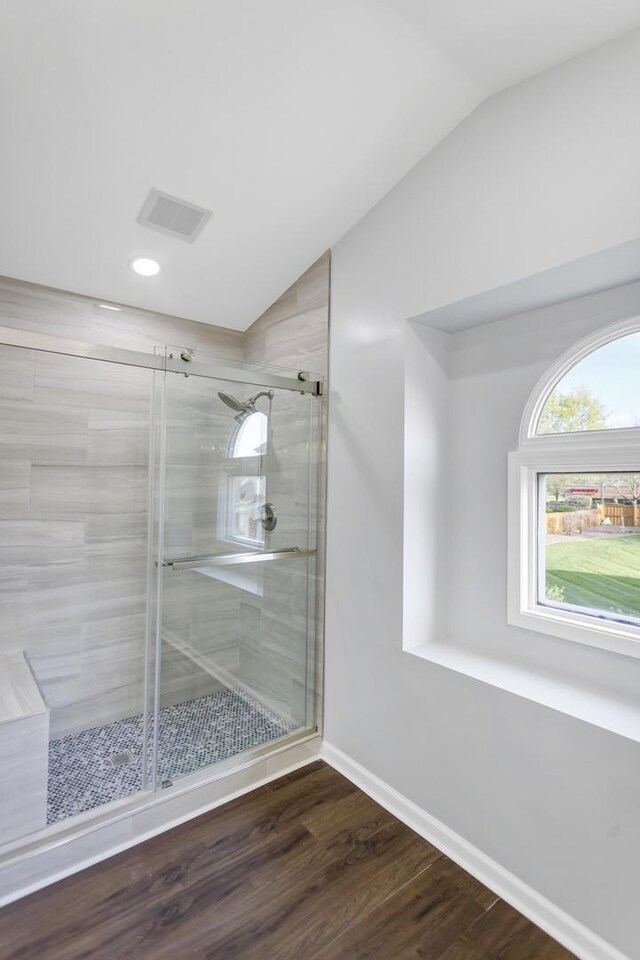 8 Cheswick Ct, Schaumburg, IL 60194 - full bath featuring lofted ceiling, a shower stall, wood finished floors, and recessed lighting