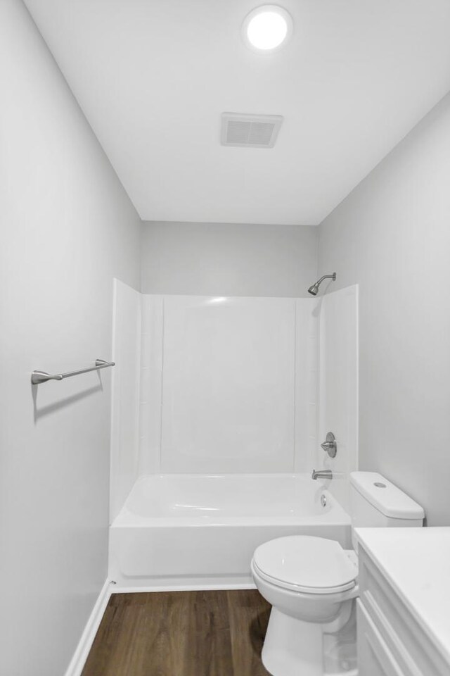 8 Cheswick Ct, Schaumburg, IL 60194 - bathroom featuring wood finished floors, vanity, and bathing tub / shower combination