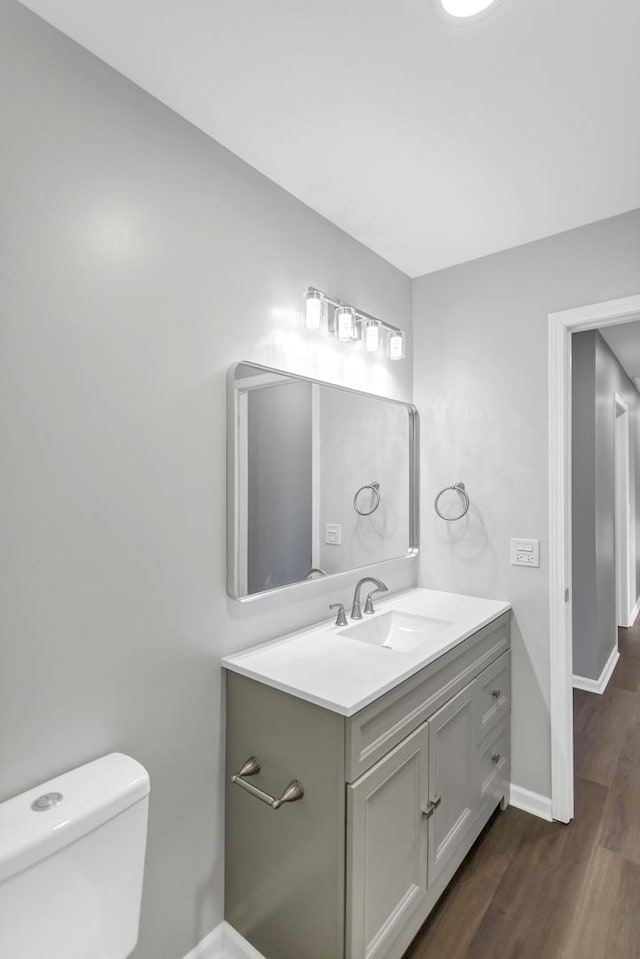 8 Cheswick Ct, Schaumburg, IL 60194 - bathroom with vanity and wood finished floors