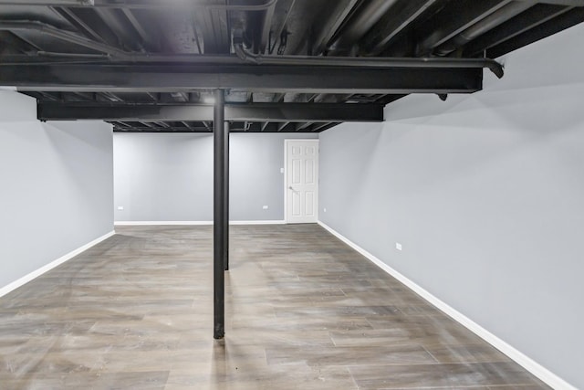 8 Cheswick Ct, Schaumburg, IL 60194 - finished below grade area featuring baseboards and wood finished floors