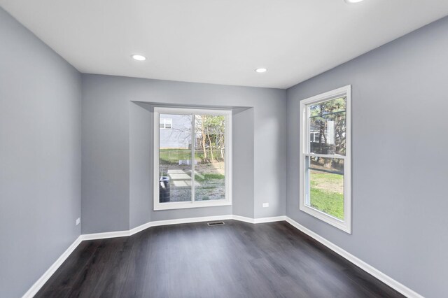 8 Cheswick Ct, Schaumburg, IL 60194 - unfurnished room with dark wood-type flooring, healthy amount of natural light, and recessed lighting