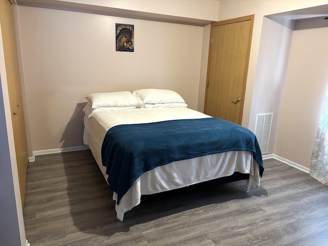 231 N Mill Rd Unit 11, Addison, IL 60101 - bedroom with wood finished floors and a closet