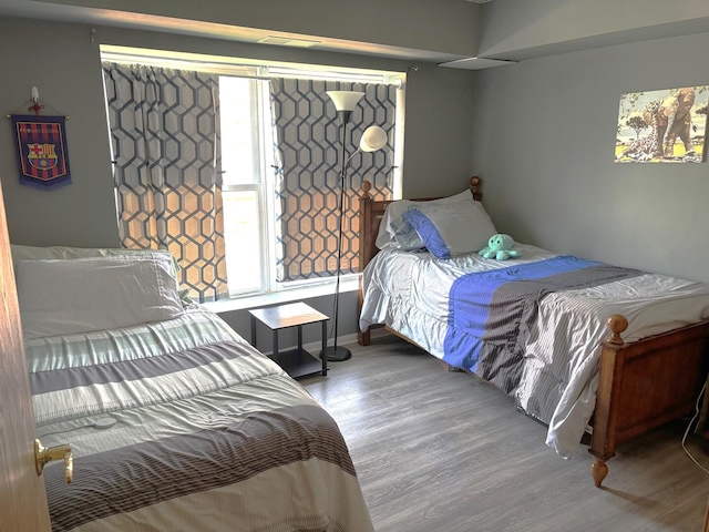 231 N Mill Rd Unit 11, Addison, IL 60101 - bedroom featuring wood finished floors