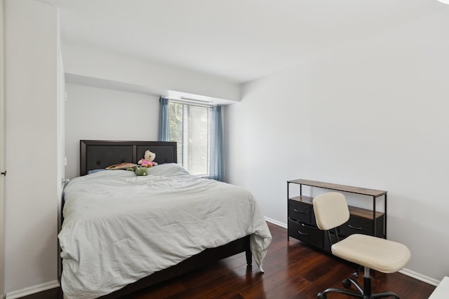 907 S Williams St Unit 206, Westmont, IL 60559 - bedroom featuring wood finished floors and baseboards
