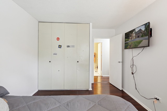 907 S Williams St Unit 206, Westmont, IL 60559 - bedroom with wood finished floors and baseboards