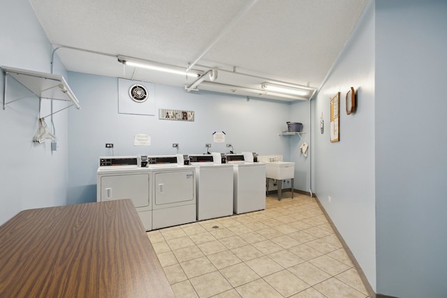 907 S Williams St Unit 206, Westmont, IL 60559 - shared laundry with independent washer and dryer and light tile patterned floors