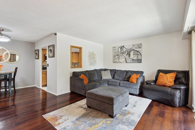 907 S Williams St Unit 206, Westmont, IL 60559 - living area with dark wood-style flooring and a textured ceiling
