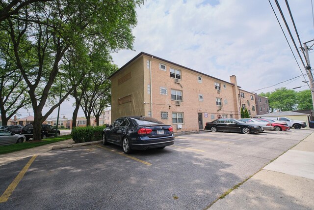 6101 N Elston Ave Unit 3E, Chicago, IL 60646 - view of building exterior with uncovered parking