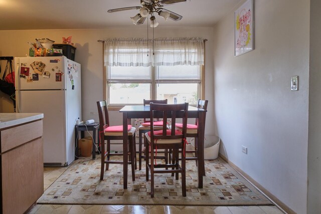 6101 N Elston Ave Unit 3E, Chicago, IL 60646 - dining area with a ceiling fan and baseboards
