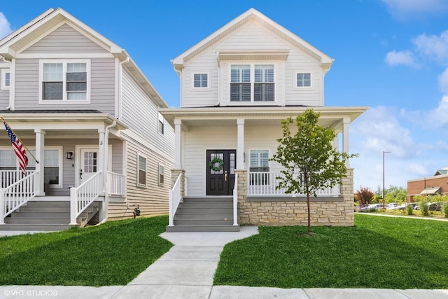 1 N Beverly Ln, Arlington Heights, IL 60004 - view of front facade with a porch and a front lawn