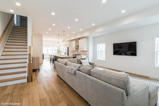 1 N Beverly Ln, Arlington Heights, IL 60004 - living room with light wood-style floors, stairway, and recessed lighting