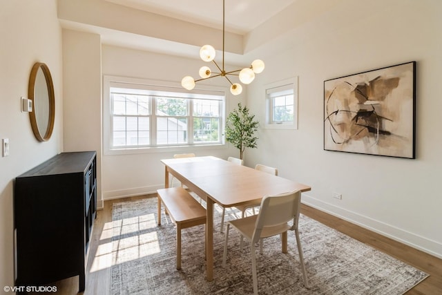 1 N Beverly Ln, Arlington Heights, IL 60004 - dining area with wood finished floors and a chandelier