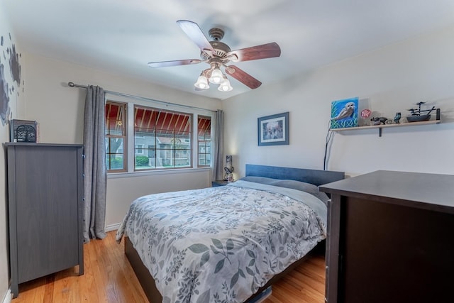 3631 54th Ave, Cicero, IL 60804 - bedroom with light wood-style flooring and a ceiling fan