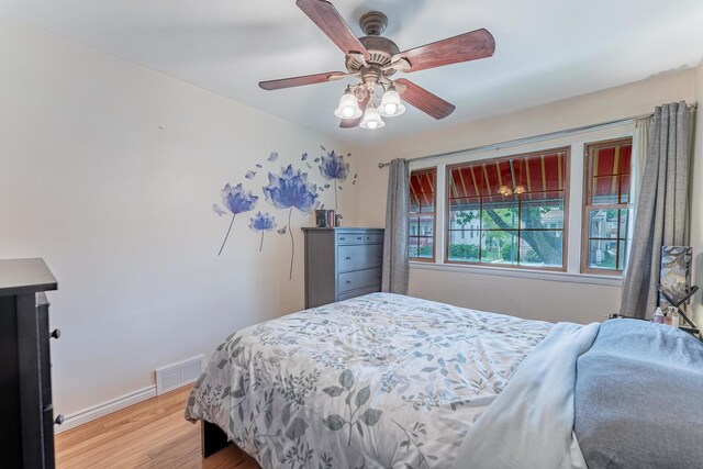 3631 54th Ave, Cicero, IL 60804 - bedroom featuring light wood finished floors and a ceiling fan