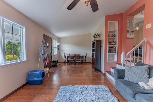 3631 54th Ave, Cicero, IL 60804 - living area featuring wood finished floors, ceiling fan, and stairs