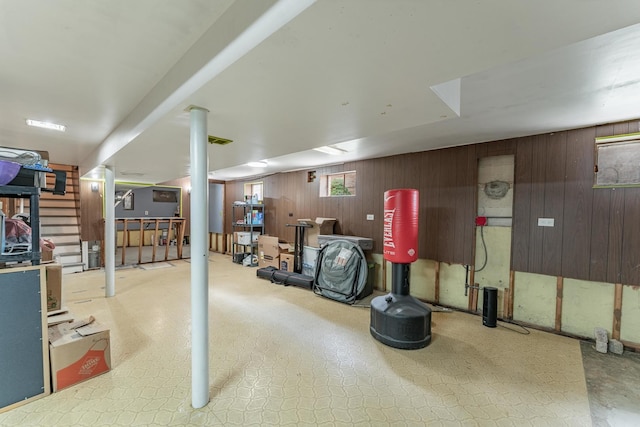3631 54th Ave, Cicero, IL 60804 - below grade area featuring wood walls, carpet flooring, and stairway