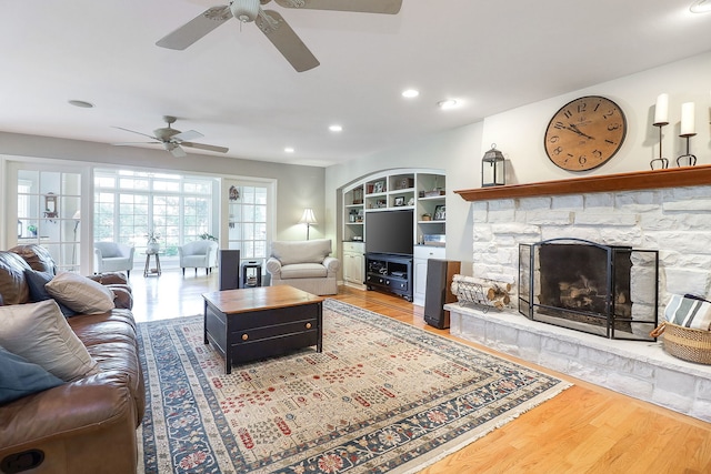 1549 Preston Rd, Naperville, IL 60563 - living area with a ceiling fan, wood finished floors, recessed lighting, a fireplace, and built in features