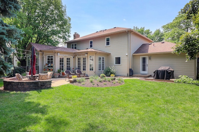 1549 Preston Rd, Naperville, IL 60563 - back of house with a patio, a chimney, a yard, and french doors