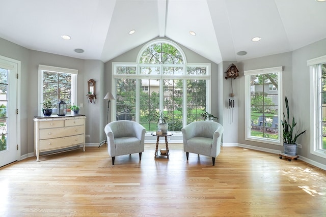 1549 Preston Rd, Naperville, IL 60563 - living area with healthy amount of natural light, lofted ceiling, light wood finished floors, and recessed lighting