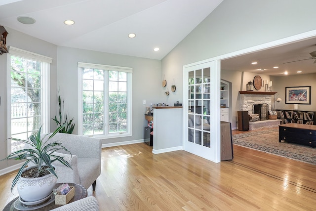 1549 Preston Rd, Naperville, IL 60563 - sitting room with wood finished floors, vaulted ceiling, recessed lighting, a fireplace, and a ceiling fan