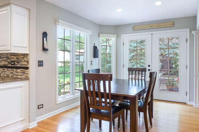 1549 Preston Rd, Naperville, IL 60563 - dining area with plenty of natural light, light wood-style flooring, recessed lighting, and french doors