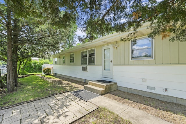 5902 Fox Lake Rd, Mchenry, IL 60051 - view of front of home with board and batten siding and a patio