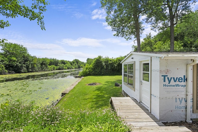 5902 Fox Lake Rd, Mchenry, IL 60051 - view of grassy yard with a water view and an outbuilding