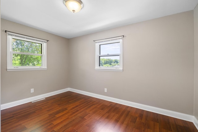 5902 Fox Lake Rd, Mchenry, IL 60051 - unfurnished room featuring healthy amount of natural light and dark wood finished floors