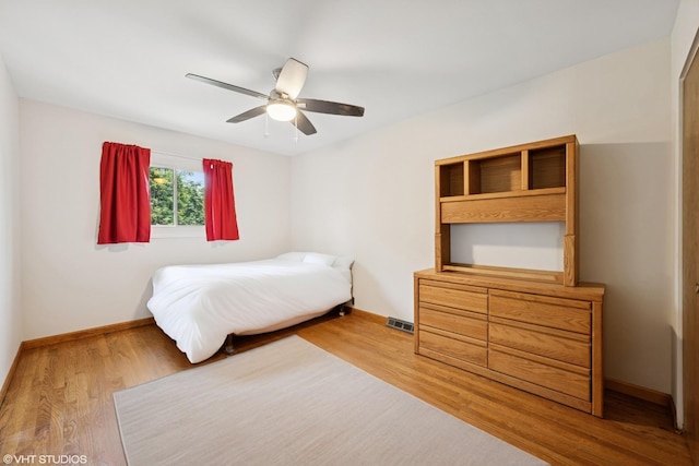 345 Catalpa Ave, Roselle, IL 60172 - bedroom featuring wood finished floors and a ceiling fan